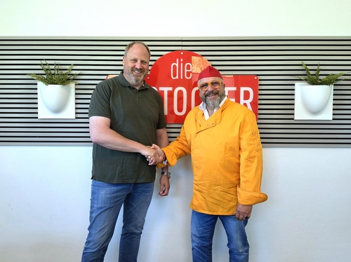 „Curry-Paule“ wächst weiter: Berliner Kultmarke holt dritten starken Lizenzpartner an Bord